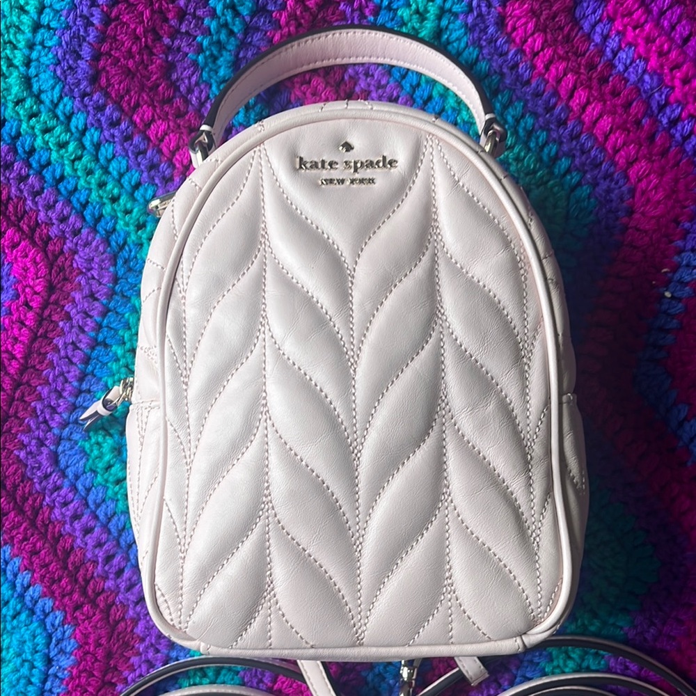 Kate Spade Cream Backpack Chic and Versatile